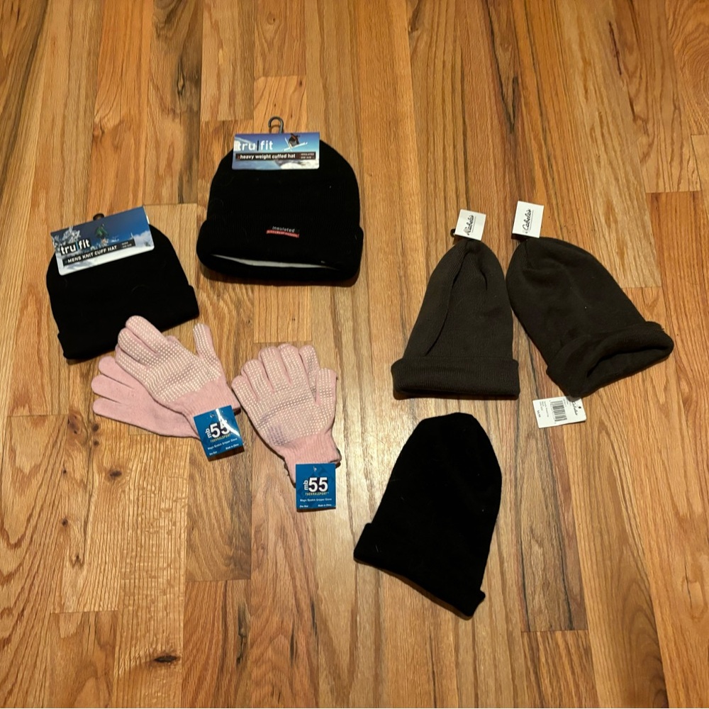 Assortment of winter hats and gloves (some tags are Cabelas)